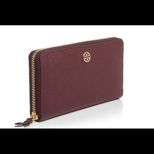 NWT Tory Burch wine/burgundy color wallet.